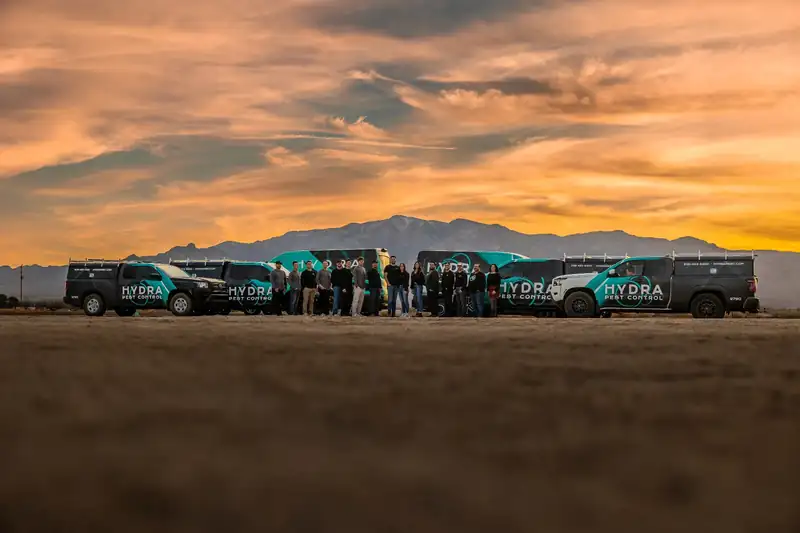 Hydra Pest Control team at sunset